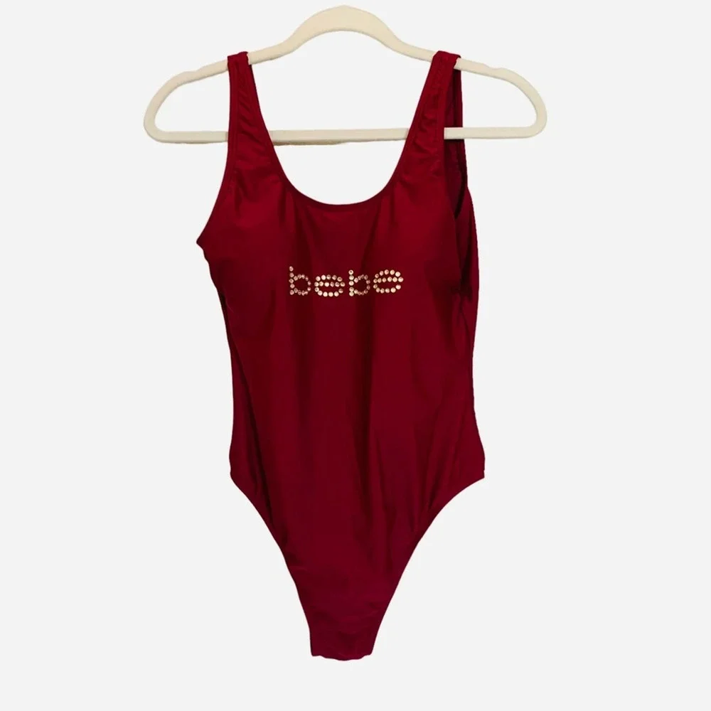 bebe | NWT size medium Burgandy low back one piece swimsuit with rhinestones